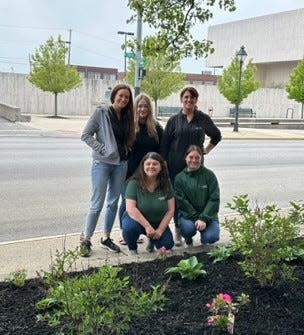Cummins employees are the backbone of the company. They also give back, including caring for a flowerbed in downtown Marion.