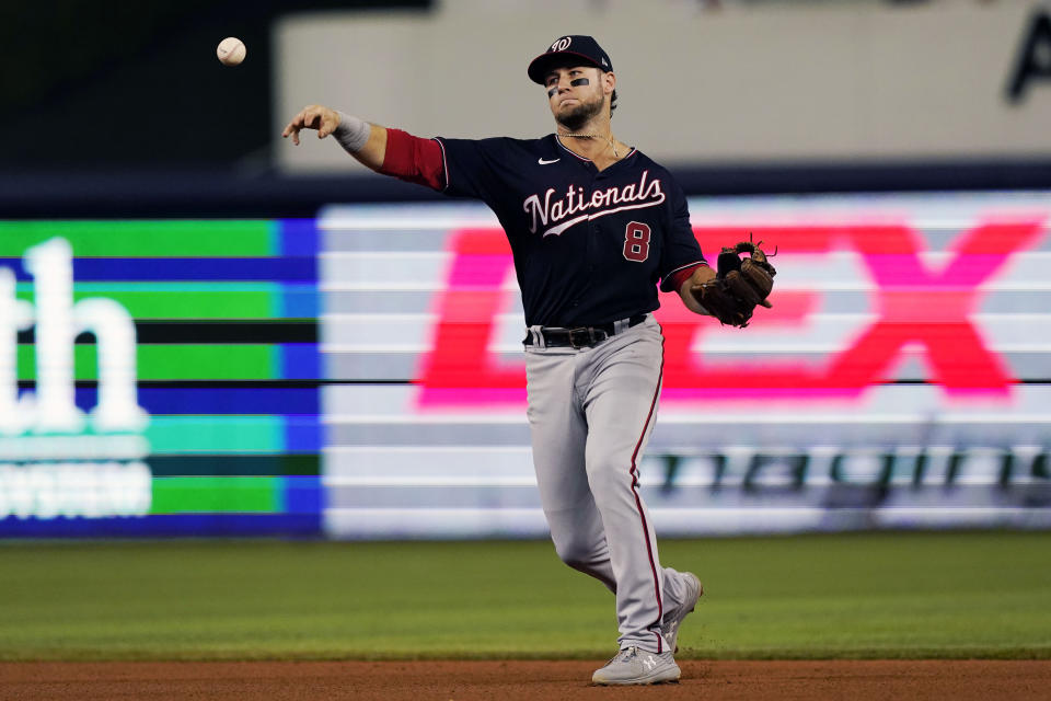 FILE - Washington Nationals shortstop Carter Kieboom fields a hit during a baseball game against the Miami Marlins, Sept. 20, 2021, in Miami. Kieboom will undergo season-ending Tommy John surgery for the elbow issue that landed him on the injured list in March. (AP Photo/Marta Lavandier, File)