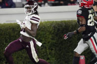 Mississippi State wide receiver Jaden Walley (31) scores a touchdown next to Georgia defensive back Christopher Smith during the first half of an NCAA college football game, Saturday, Nov. 21, 2020, in Athens, Ga. (AP Photo/Brynn Anderson)