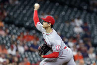 Los Angeles Angels starting pitcher Shohei Ohtani throws against the Houston Astros during the first inning of a baseball game Tuesday, May 11, 2021, in Houston. (AP Photo/Michael Wyke)