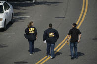 <p>Bureau of Alcohol, Tobacco, Firearms and Explosive (ATF) police members walk near the crime scene of an early morning shooting in Alexandria, Virginia, June 14, 2017. (Photo: Brendan Smialowski/AFP/Getty Images) </p>