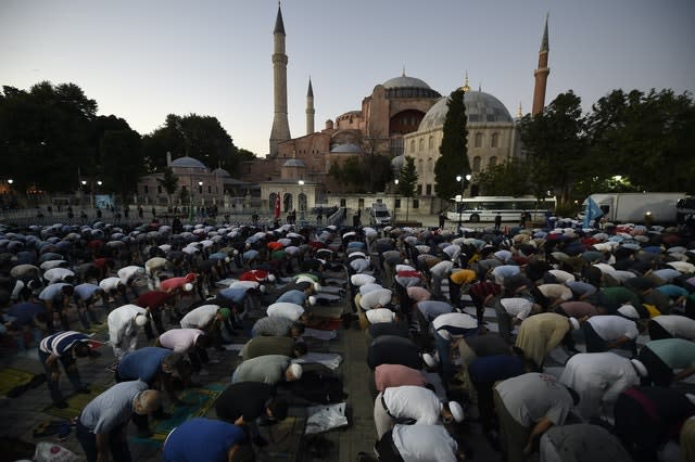 Muslims offer their evening prayers outside the Byzantine-era Hagia Sophia (Emrah Gurel/AP)