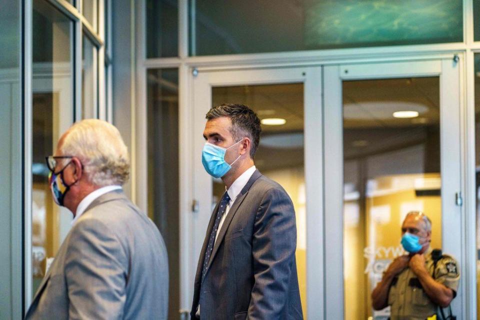 Former Minneapolis Police officer Thomas Lane, center, arrives with his attorney Earl Gray for a hearing at the Hennepin County Public Safety Facility on June 29, 2020, in Minneapolis, Minnesota. / Credit: KEREM YUCEL/AFP via Getty Images