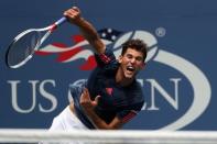 Sep 5, 2016; New York, NY, USA; Dominic Thiem of Austria serves against Juan Martin Del Potro of Argentina (not pictured) on day eight of the 2016 U.S. Open tennis tournament at USTA Billie Jean King National Tennis Center. Del Potro won 6-3, 3-2 (ret.). Mandatory Credit: Geoff Burke-USA TODAY Sports