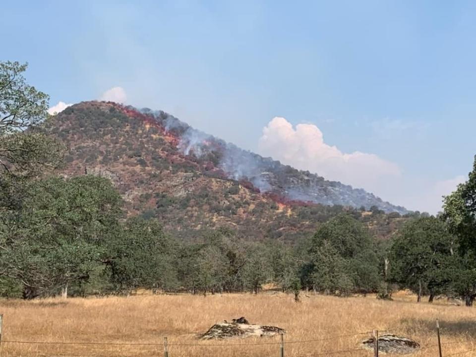 A wildfire burning roughly 5 miles from Three Rivers has forced an evacuation warning for nearby residents.