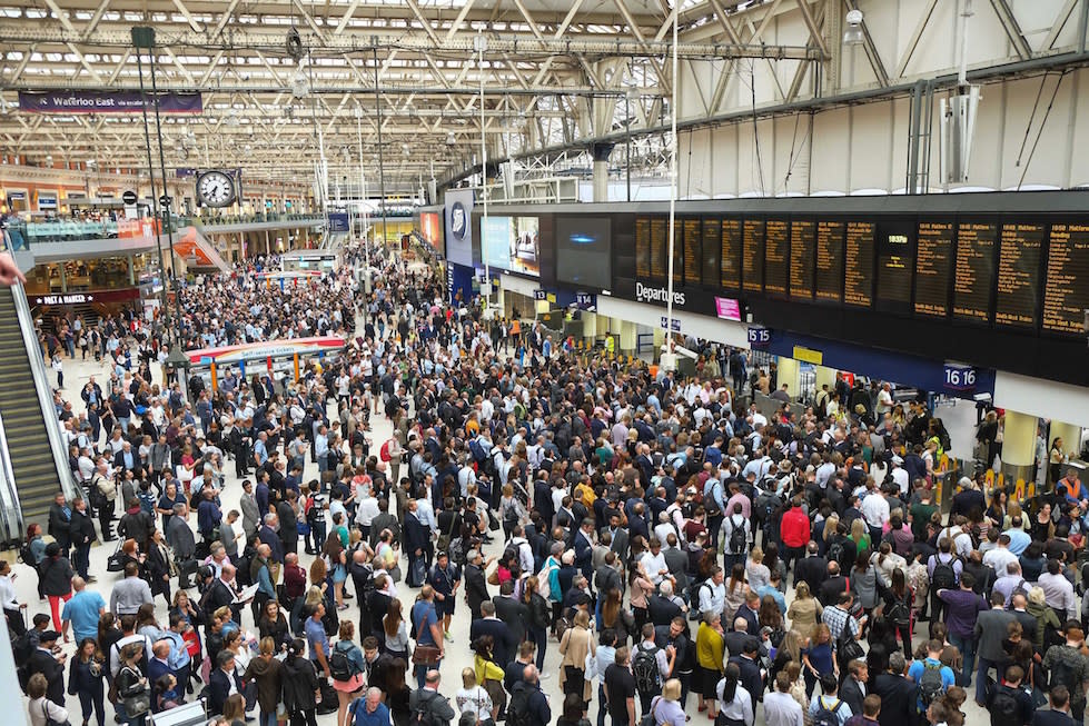 Commuters battle the crowds at Waterloo station in London (Picture: PA)