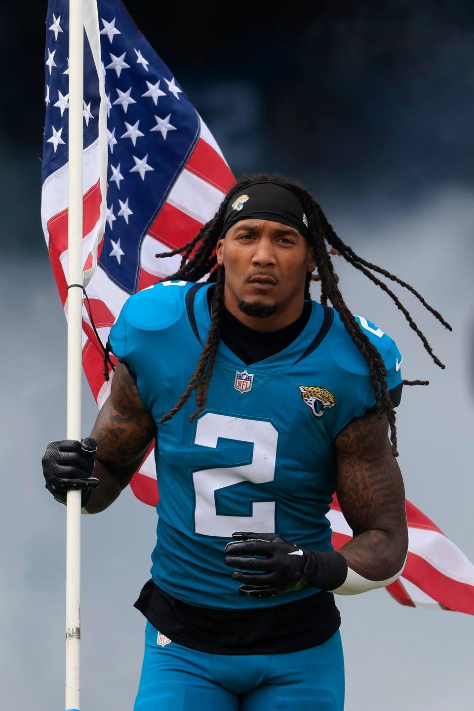 Jacksonville Jaguars safety Rayshawn Jenkins (2) takes to the field with the U.S. flag, during Salute to Service recognition, before a regular season NFL football matchup Sunday, Nov. 6, 2022 at TIAA Bank Field in Jacksonville. The Jacksonville Jaguars held off the Las Vegas Raiders 27-20. [Corey Perrine/Florida Times-Union]