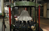 A hat is moulded by machinery inside the Borsalino hat factory, in Spinetta Marengo, near Alessandria, Italy, Thursday, Jan. 17, 2019. Borsalino's prized felt hats are handmade by 80 workers in its Piemonte factory, many who have worked there for decades, with original machinery that use hot water and steam to transform rabbit fur into highly prized felt, that is formed into clochards, dyed and molded by hand to create the latest styles. (AP Photo/Antonio Calanni)