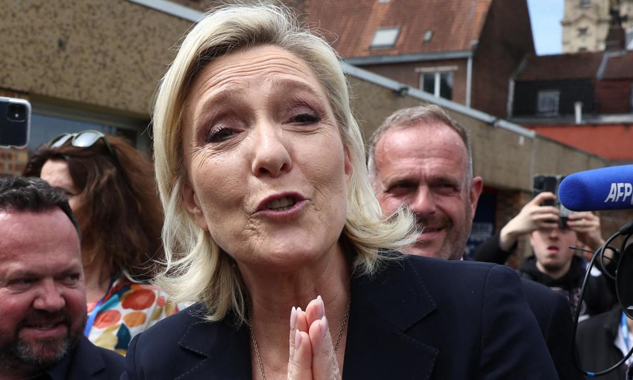 <span>Marine Le Pen votes in Henin-Beaumont in the first round of the French legislative elections on Sunday.</span><span>Photograph: Yves Herman/Reuters</span>