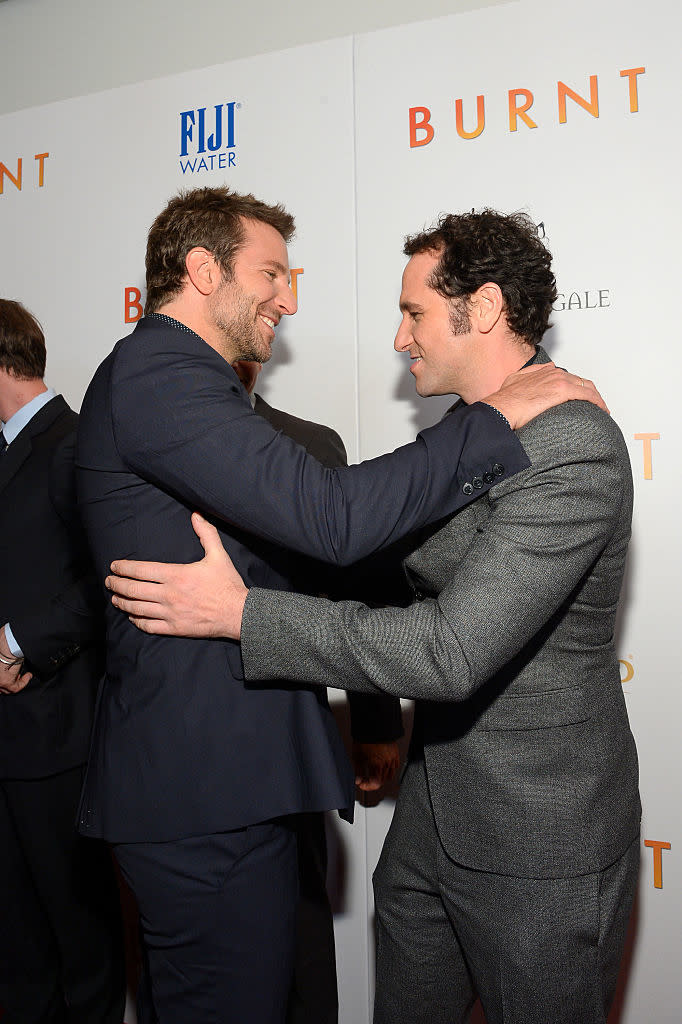 Closeup of Bradley Cooper and Matthew Rhys