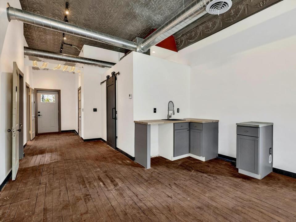 A small kitchen area in the corner of the front room.