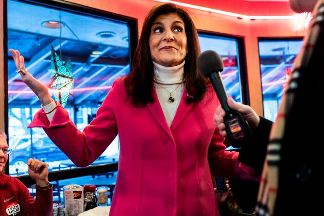 <p>Melina Mara/The Washington Post via Getty</p> Nikki Haley speaks to journalists at the Drake Diner in Des Moines on the day of the Iowa caucuses