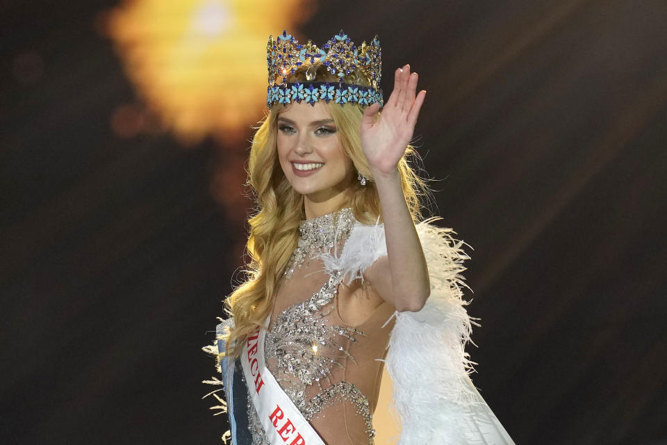 Krystyna Pyszková of Czech Republic waves after she was crowned Miss World in Mumbai, India, Saturday, Mar. 9, 2024. (AP Photo/Rajanish Kakade)