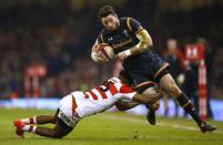 Britain Rugby Union - Wales v Japan - Principality Stadium, Cardiff, Wales - 19/11/16 Wales' Alex Cuthbert in action against Japan's Kotaro Matsushima (L) Action Images via Reuters / Peter Cziborra Livepic