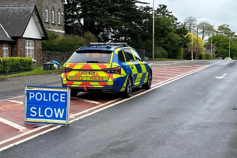 Police at the scene of the crash in May