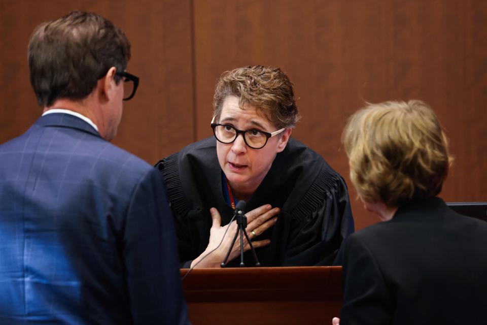 Judge Penney Azcarate confers with lawyers representing Johnny Depp and Amber Heard (POOL/AFP via Getty Images)