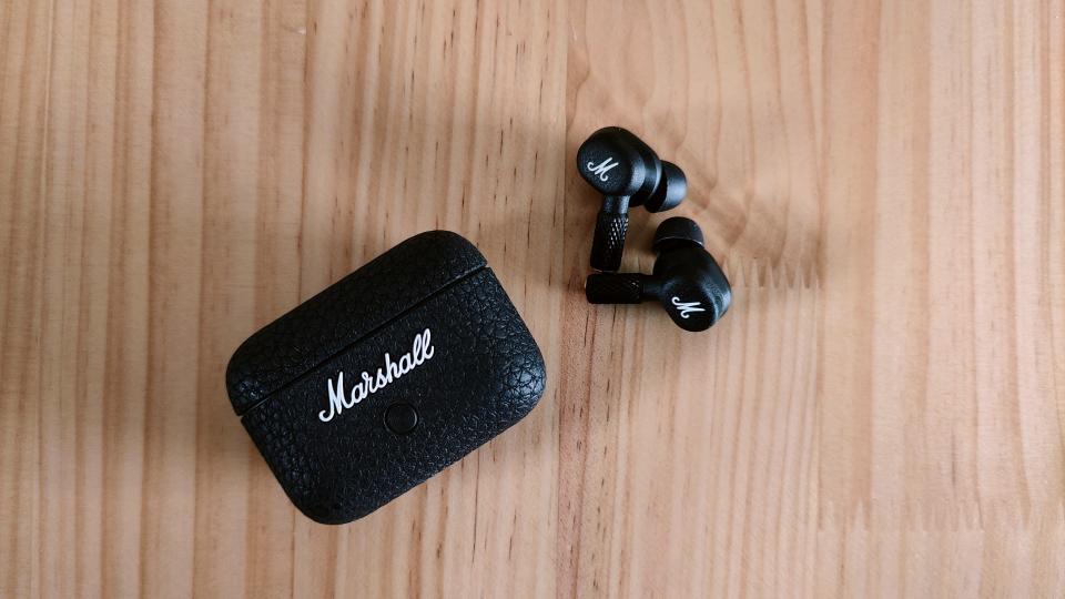 Marshall Motif II ANC review: earbuds next to charging case