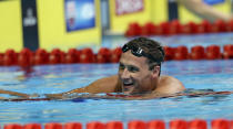 Ryan Lochte smiles after swimming in the men's 400-meter individual medley final at the U.S. Olympic swimming trials, Monday, June 25, 2012, in Omaha, Neb. (AP Photo/David Phillip)