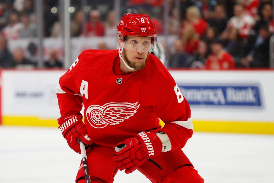 Detroit Red Wings left wing Justin Abdelkader (8) plays against the Calgary Flames in the first period of an NHL hockey game Sunday, Feb. 23, 2020, in Detroit. (AP Photo/Paul Sancya)