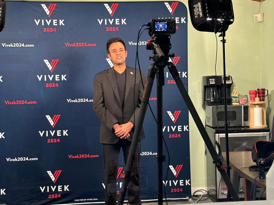 GOP presidential candidate Vivek Ramaswamy stands in a makeshift television studio for an appearance on right-wing television network Real America’s Voice on 2 June 2023 (Andrew Feinberg / The Independent)