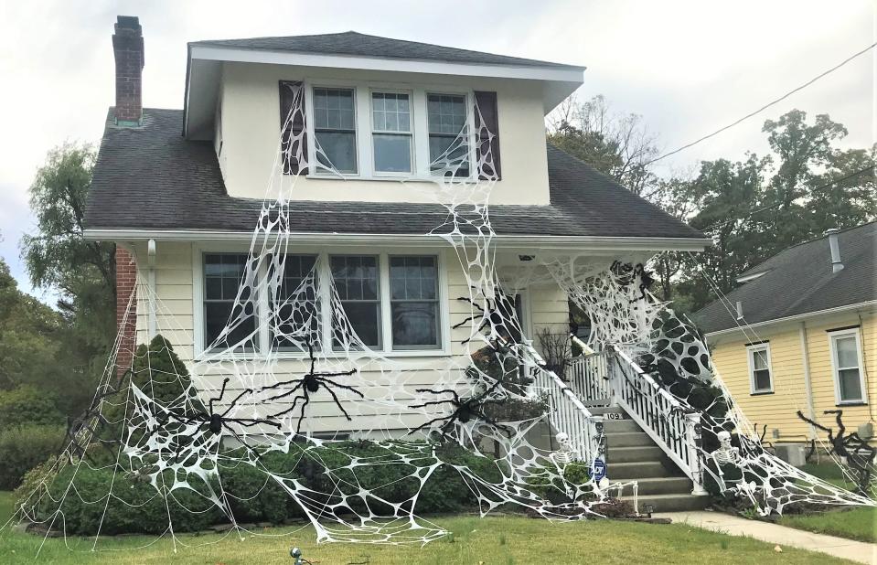 What's Halloween without some creepy-crawlies to greet you, as at this house on Columbia Avenue in Pitman? PHOTO: Oct. 20, 2023.