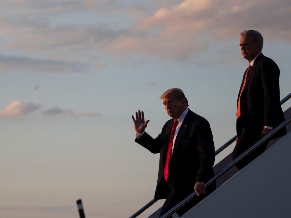 President Donald Trump steps off Air Force One, followed by House Minority Leader Kevin McCarthy of Calif., as he returns Saturday, May 30, 2020, at Andrews Air Force Base, Md. Trump is returning from Kennedy Space Center for the SpaceX Falcon 9 Launch. (AP Photo/Alex Brandon)