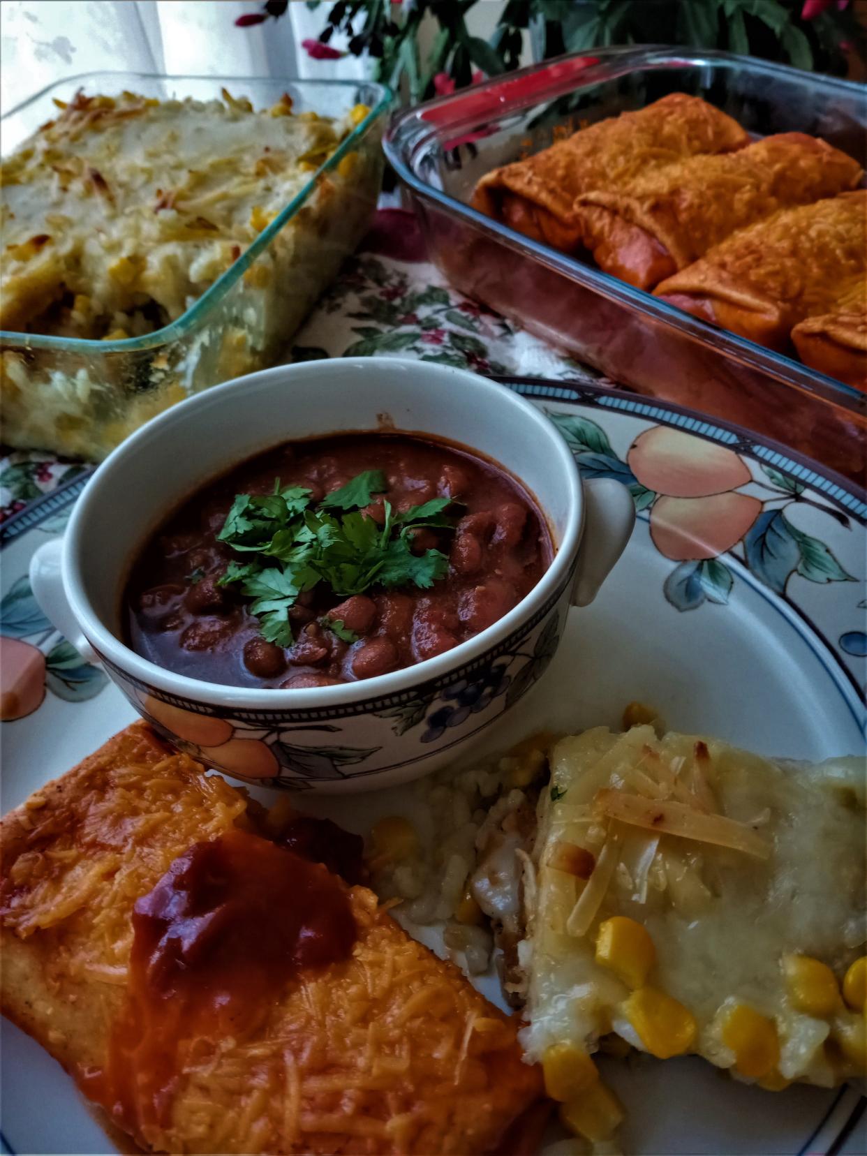 From bowl clockwise, Frijoles Borrachos, Chicken Chimichanga Casserole, Easy Beef Enchiladas