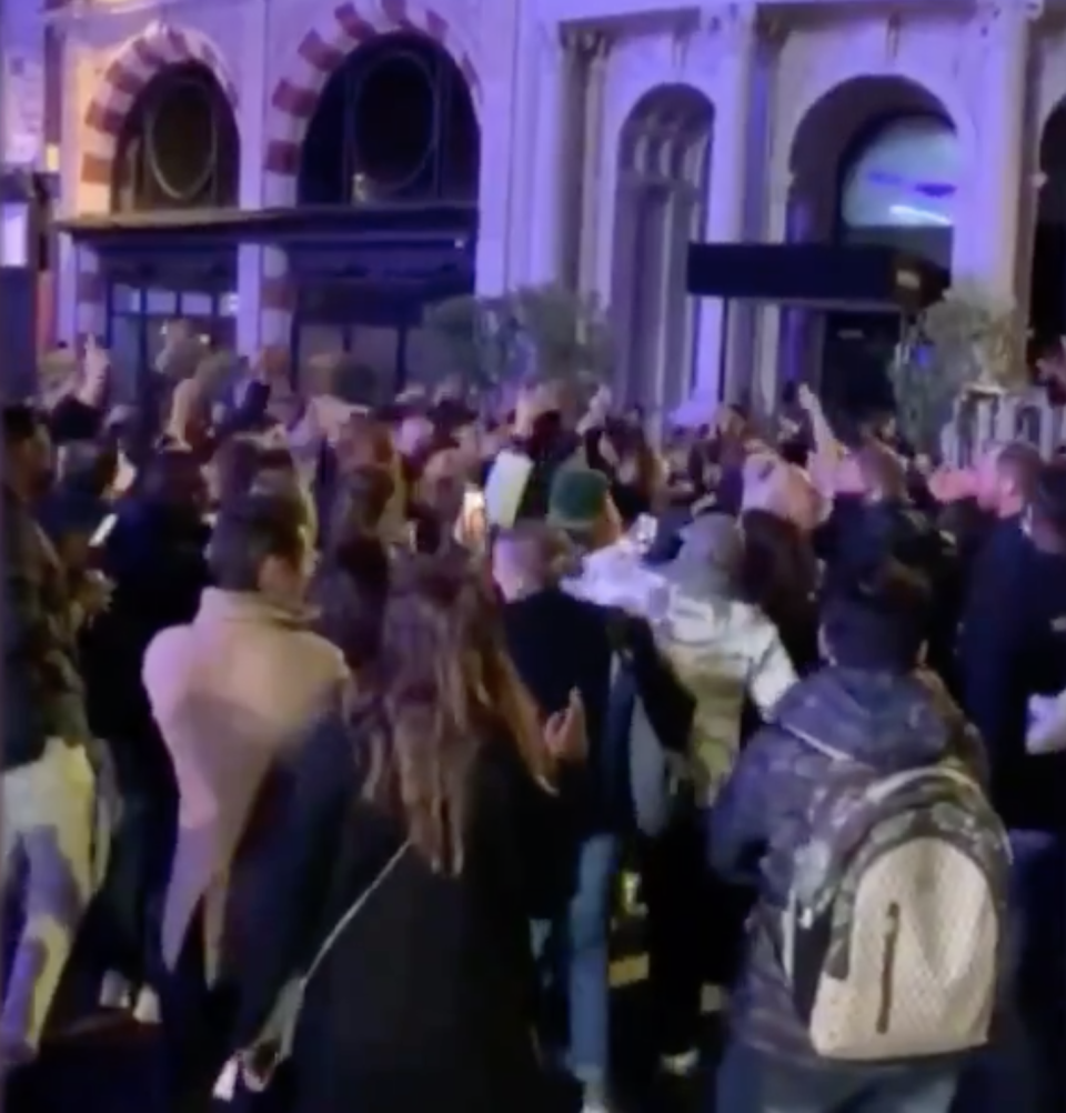 London party-goers seen in the street despite virus warnings. 