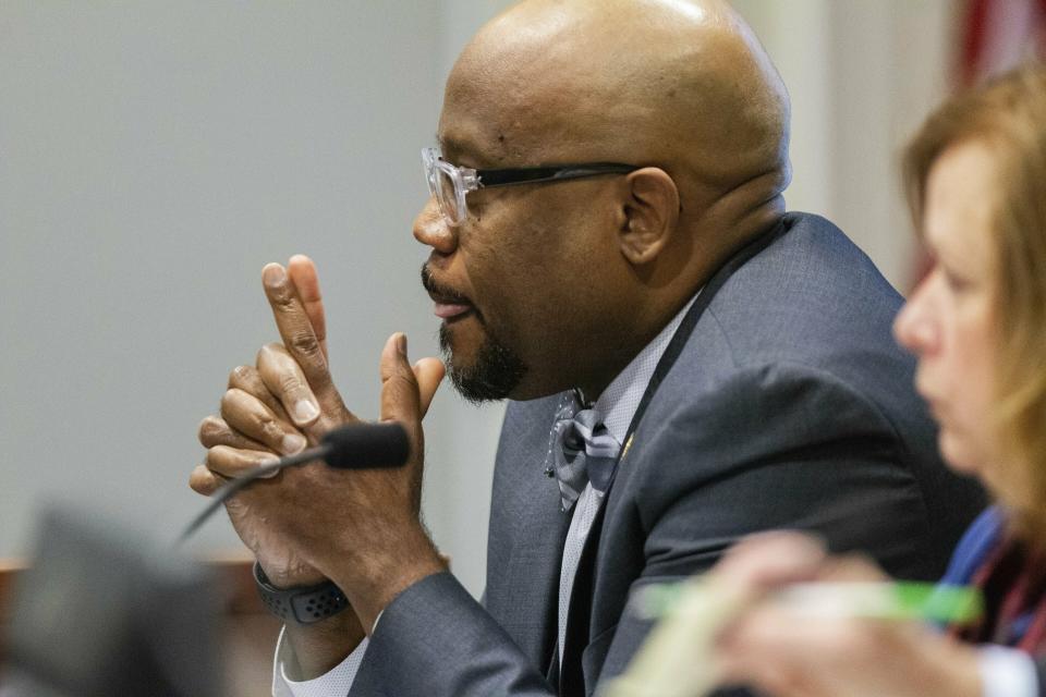 Board of Elections member Jeff Carmon listens to testimony during the fourth day of a public evidentiary hearing on the 9th congressional district voting irregularities investigation Thursday, Feb. 21, 2019, at the North Carolina State Bar in Raleigh, N.C. (Travis Long/The News & Observer via AP, Pool)