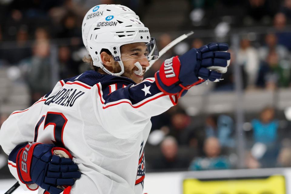 Columbus Blue Jackets left wing Johnny Gaudreau celebrates his overtime goal against the San Jose Sharks in an NHL hockey game in San Jose, Calif., Tuesday, March 14, 2023. (AP Photo/Josie Lepe)