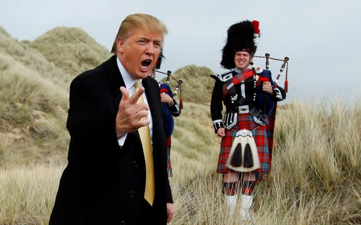 Trump during a media event on the sand dunes of his then-proposed golf resort near Aberdeen, Scotland, in 2010. (Photo: David Moir/Reuters)