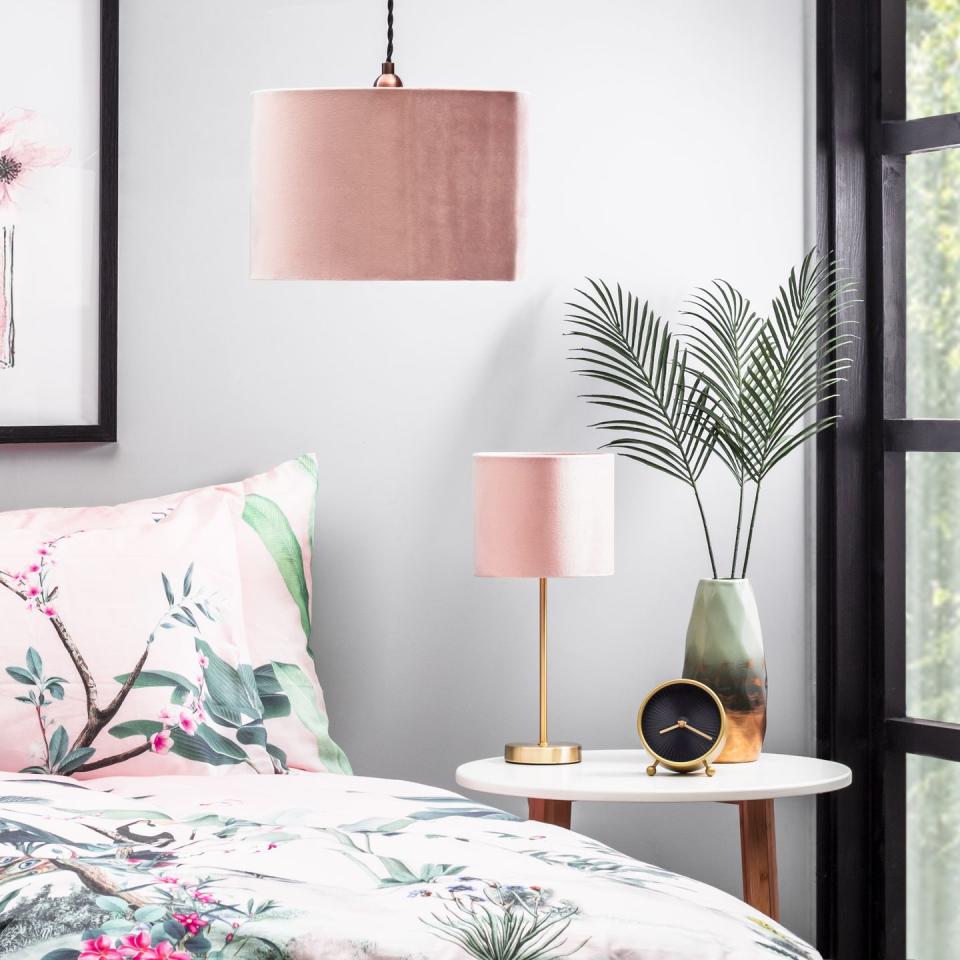 <p>'Offering an alternative to white and wood effect, grey has been growing in popularity in bedroom furniture and offers a calming neutral base to build colour around,' says Megan Baker, Head of Design at <a href="https://www.myfittedbedroom.com/" rel="nofollow noopener" target="_blank" data-ylk="slk:My Fitted Bedroom;elm:context_link;itc:0;sec:content-canvas" class="link ">My Fitted Bedroom</a>.</p><p>'Using pink accents in the bedroom can give life and vibrancy to a more neutral backdrop.'</p><p>• Velvet 30cm Easyfit Shade, Pink and Brass, £22, <a href="https://go.redirectingat.com?id=127X1599956&url=https%3A%2F%2Fwww.bhs.com%2Fvelvet-30cm-shade-pink-brass.html&sref=https%3A%2F%2Fwww.housebeautiful.com%2Fuk%2Fdecorate%2Fbedroom%2Fg37103497%2Fpink-grey-bedroom%2F" rel="nofollow noopener" target="_blank" data-ylk="slk:BHS;elm:context_link;itc:0;sec:content-canvas" class="link ">BHS</a></p>