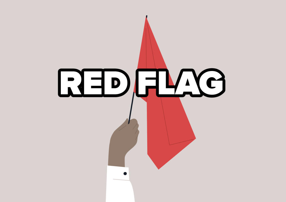 A hand waving a red flag