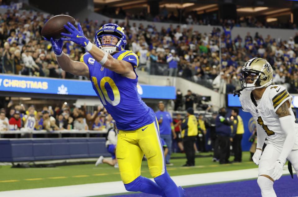 Rams receiver Cooper Kupp misses a pass in the end zone last season as Saints cornerback Alontae Taylor pursues.