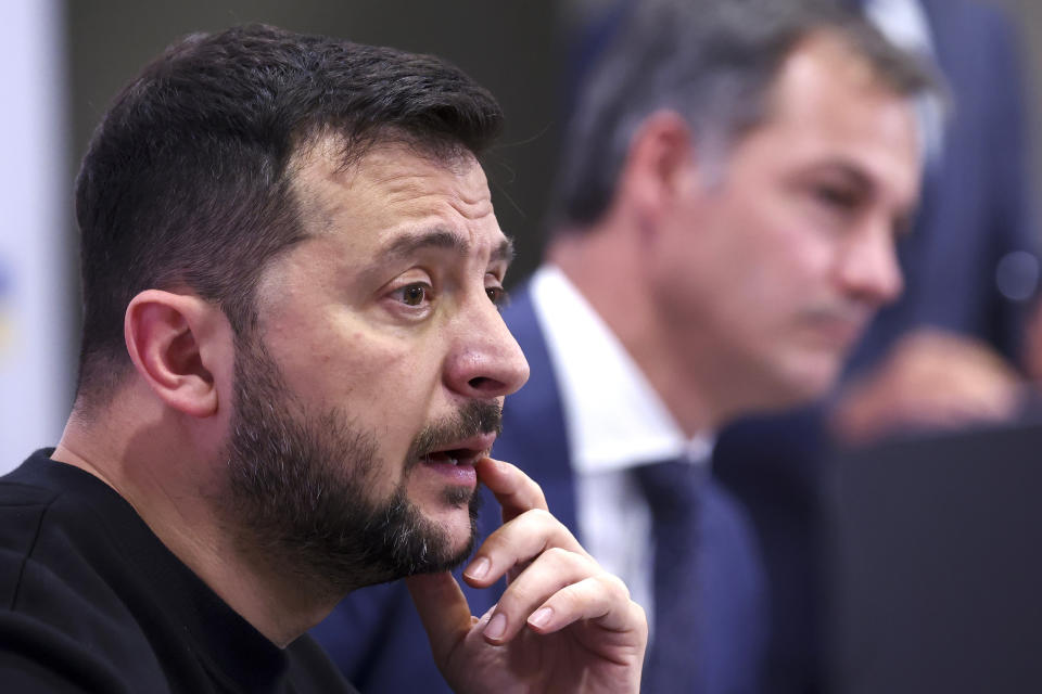 Ukraine's President Volodymyr Zelenskyy, left, and Belgium's Prime Minister Alexander De Croo address a media conference at the prime ministers office in Brussels, Wednesday, Oct. 11, 2023. (Yves Herman, Pool Photo via AP)