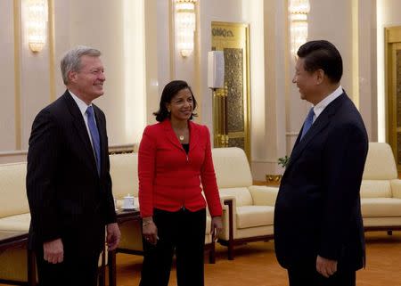 U.S. National Security Advisor Susan Rice (C) and U.S. Ambassador to China Max Baucus (L), speak with Chinese President Xi Jinping during a meeting at the Great Hall of the People in Beijing September 9, 2014. REUTERS/Andy Wong/Pool