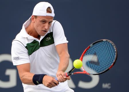 Denis Kudla of the United States hits the ball against Donald Young of the United States during the Rogers Cup tennis tournament at Uniprix Stadium, Montreal, Quebec, Canada August 10, 2015. Eric Bolte-USA TODAY Sports