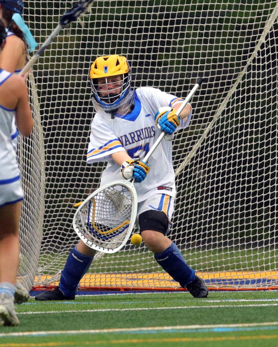 Mariemont goalkeeper Brynna O'Brien blocks a shot on goal in the Division II lacrosse regional final game between Indian Hill and Mariemont high schools at Mariemont High School May 26, 2022.