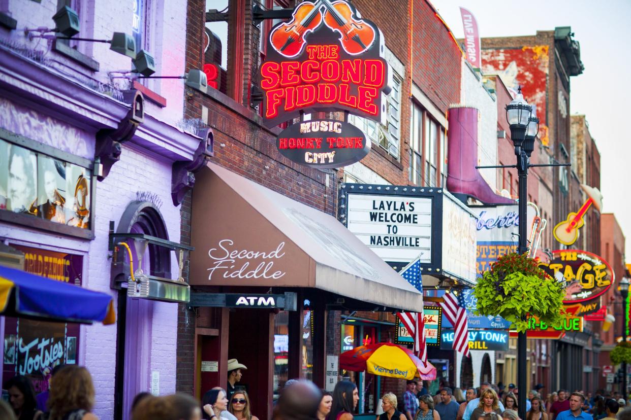 Nashville, United States - September 23, 2016: View of country western neon signs on Lower Broadway in Nashville, TN.  The district is famous for its country music entertainment and bars.