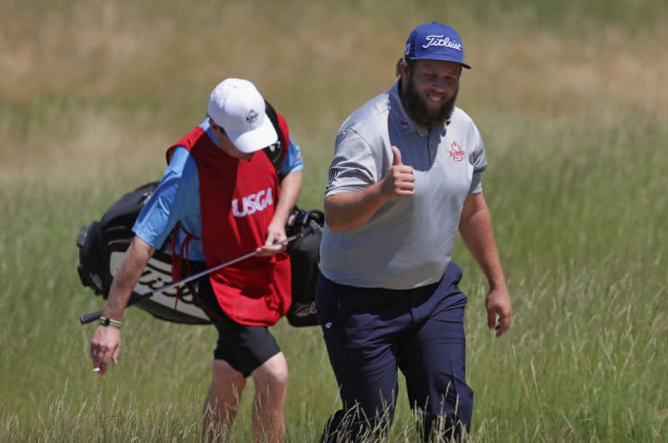 Andrew 'Beef' Johnston gives a thumbs-up to the crowd at Erin Hills. (Getty)