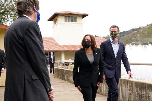 Vice President Kamala Harris, with California Gov. Gavin Newsom, visits a water treatment plant in Oakland on April 5, 2021.