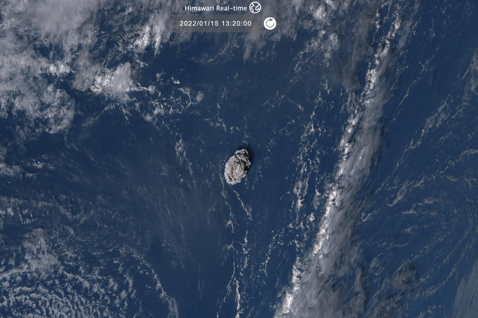 This satellite image taken by Himawari-8, a Japanese weather satellite operated by Japan Meteorological Agency and released by National Institute of Information and Communications Technology (NICT), shows an undersea volcano eruption at the Pacific nation of Tonga Saturday, Jan. 15, 2022. (NICT via AP)