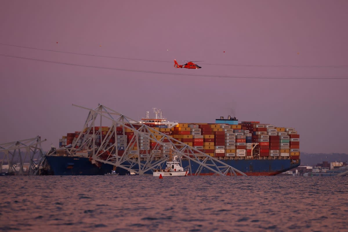 A view of the bridge and debris in the Patapsco River (REUTERS)