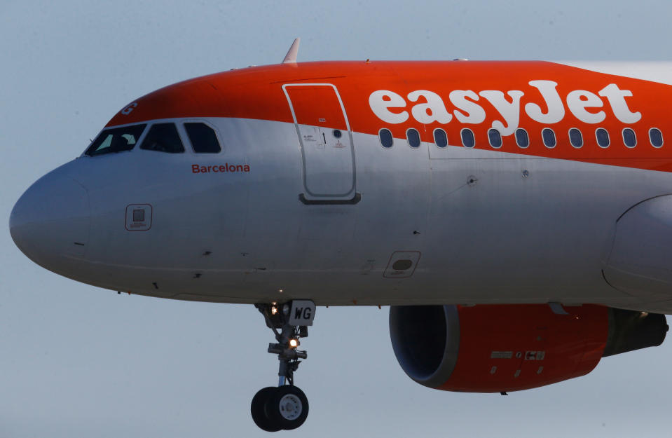 A Easy Jet Airbus A320-200 plane lands at the Nantes-Atlantique airport in Bouguenais near Nantes, France, February 12, 2019. REUTERS/Stephane Mahe