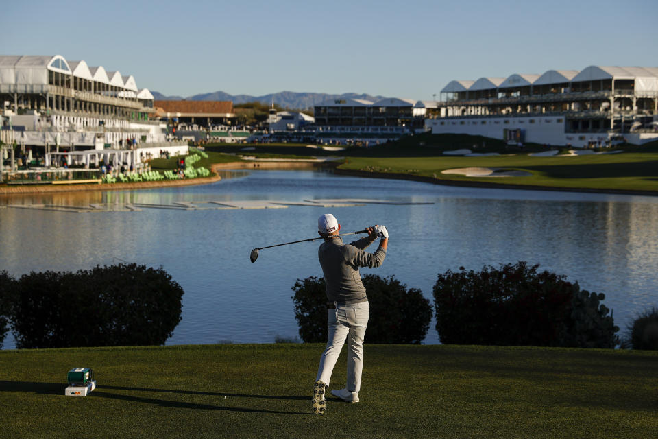 Brian Harman of the United States plays his shot from the 18th tee during the continuation of the first round of the WM Phoenix Open at TPC Scottsdale on February 10, 2023 in Scottsdale, Arizona. (Photo by Sarah Stier/Getty Images)