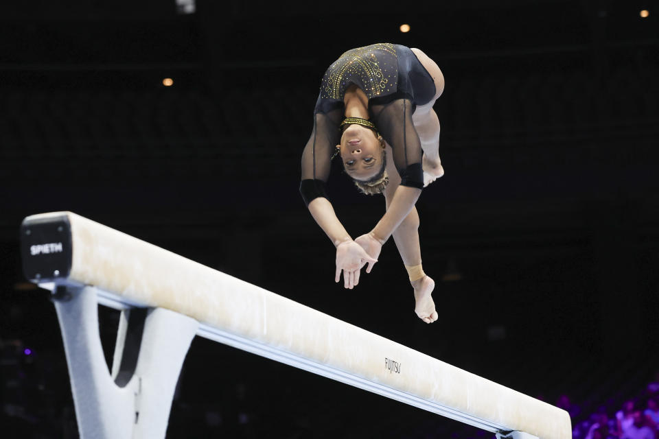 Brazil's Rebeca Andrade competes on the beam during the women's team final at the Artistic Gymnastics World Championships in Antwerp, Belgium, Wednesday, Oct. 4, 2023. (AP Photo/Geert vanden Wijngaert)