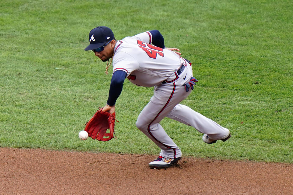 Atlanta Braves second baseman Johan Camargo catches a fielder's choice by Philadelphia Phillies' Adam Haseley during the second inning of a baseball game, Saturday, Aug. 29, 2020, in Philadelphia. Andrew Knapp was forced out at second on the play and Haseley was safe at first. (AP Photo/Matt Slocum)