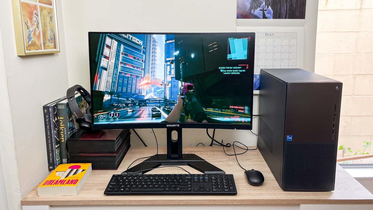  Dell XPS 8960 review unit on a desk, Cyberpunk 2077 running onscreen. 