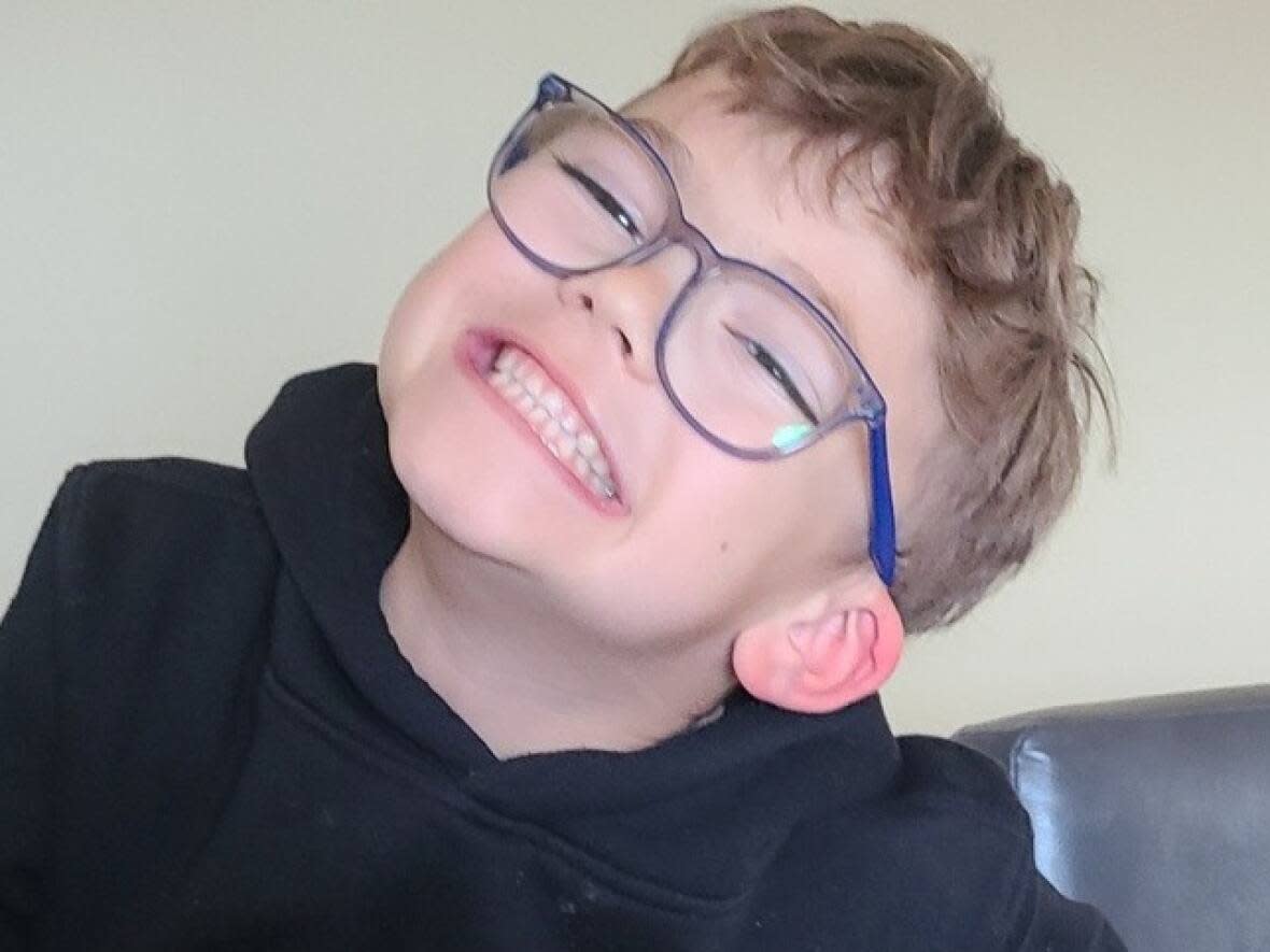 Benjamin Dufour, 7, was struck by a truck in June, resulting in debilitating injuries. His family says his condition is improving. (GoFundMe - image credit)
