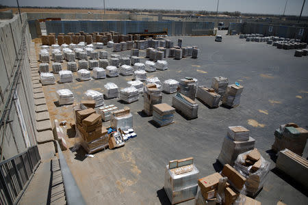 Packages of goods are seen ahead of their transfer to the Gaza Strip, inside the Kerem Shalom border crossing terminal between Israel and Gaza Strip, Israel August 15, 2018. REUTERS/Amir Cohen